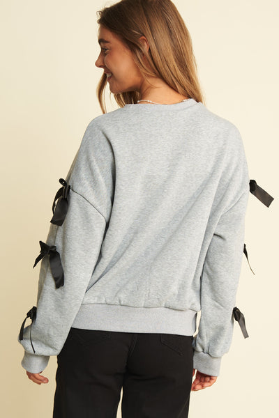 "Miles Ahead" Plus Bow Detail Loose Fit Pullover Top